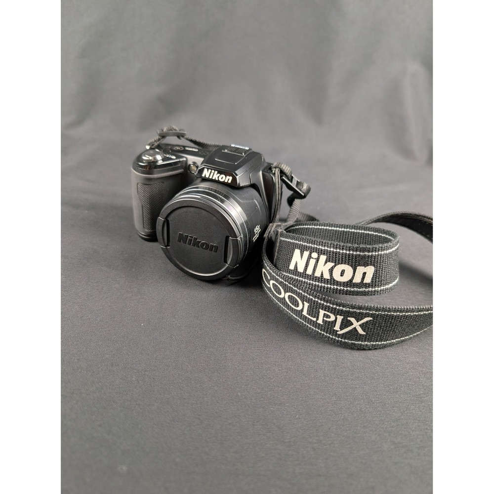 Nikon Coolpix L110 Digital Camera 2.1MP 15x Optical Zoom VR with 4GB SD Card